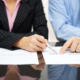 Professionnels analysant un dossier de certification QUALIOPI